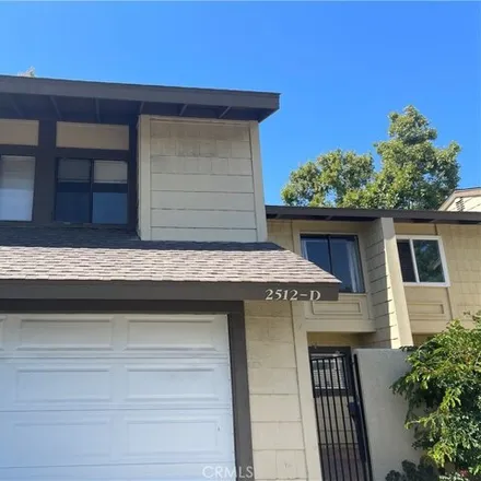Buy this 4 bed townhouse on 2602 North Tustin Avenue in Santa Ana, CA 92705