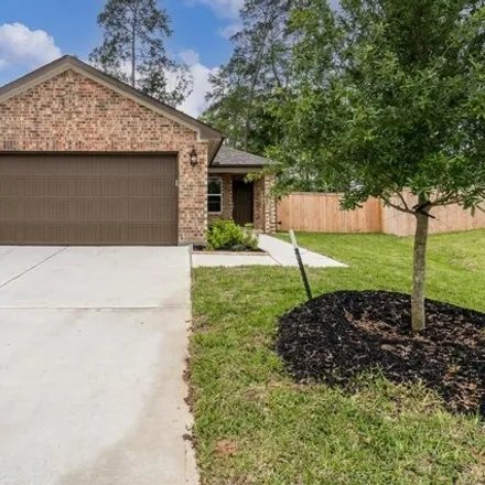 Rent this 4 bed house on Lauren Oak Drive in Conroe, TX 77304