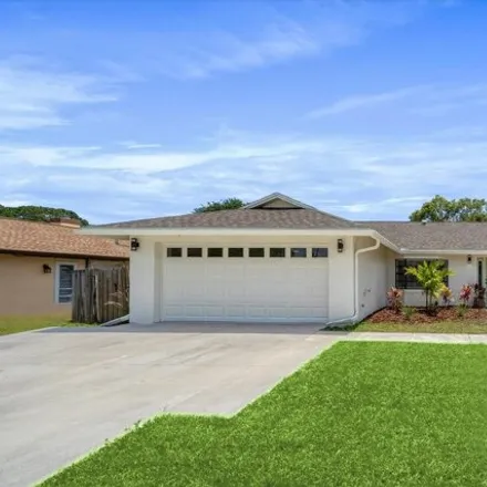 Buy this 3 bed house on 157 Copenhaver Avenue Northeast in Palm Bay, FL 32907