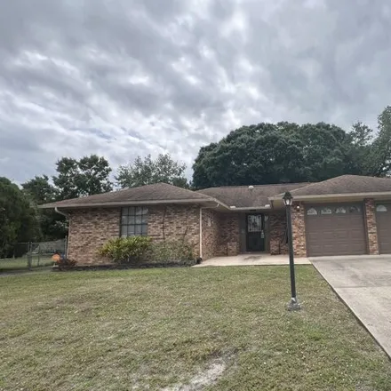 Buy this 3 bed house on 306 Albright Street Southeast in Palm Bay, FL 32909