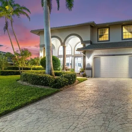 Buy this 4 bed house on 1056 Coronado Court in Marco Island, FL 34145