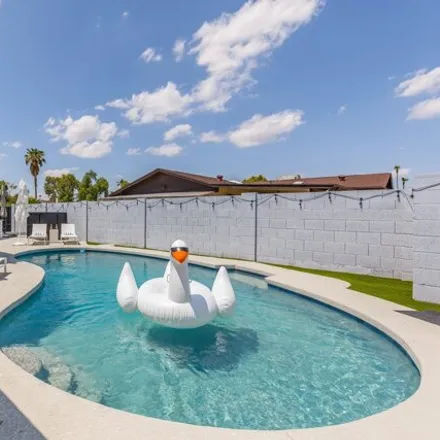 Rent this 4 bed house on 8702 East Clarendon Avenue in Scottsdale, AZ 85251