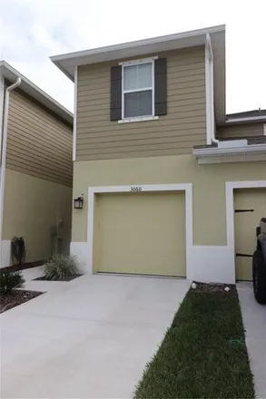 Buy this 3 bed townhouse on Inlet Breeze Way in Holiday, FL 34691