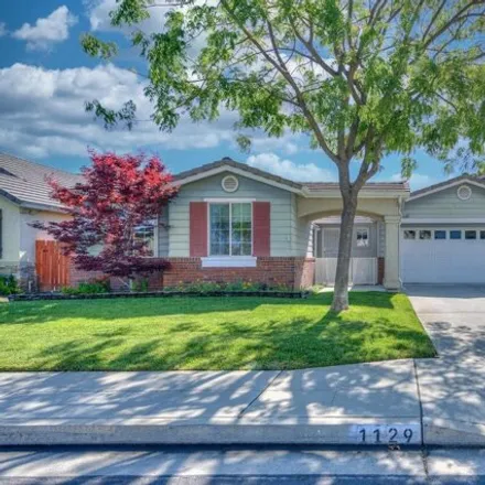 Buy this 4 bed house on 1124 Megan Avenue in Clovis, CA 93611