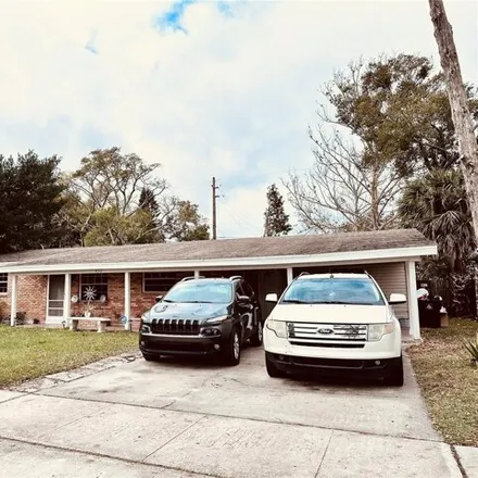 Rent this 4 bed house on 426 Santiago Avenue in Orlando, FL 32807