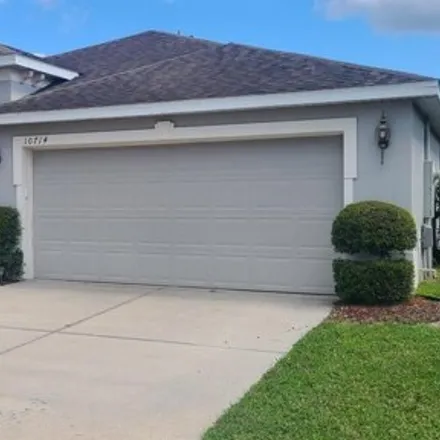 Rent this 3 bed house on 10714 Cabbage Tree Loop in Orange County, FL 32825