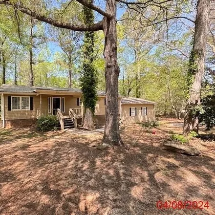 Buy this 3 bed house on 6871 Lakeshore Dr in Douglasville, Georgia