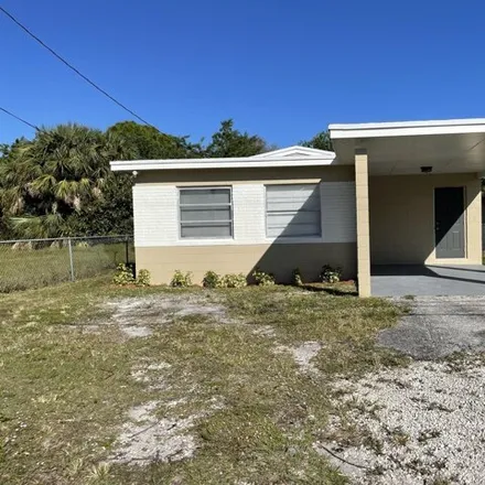 Rent this 3 bed house on 2580 Avenue I in Fort Pierce, FL 34947