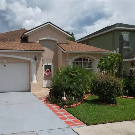 Buy this 4 bed house on 1933 Bridgeview Circle in Meadow Woods, Orange County