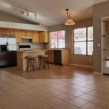 Rent this 3 bed apartment on 9915 East Onza Avenue in Mesa, AZ 85212