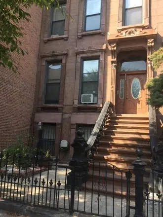 Buy this 6 bed townhouse on 355 Greene Avenue in New York, NY 11216