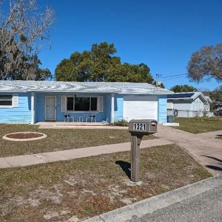 Buy this 3 bed house on 5975 Melaleuca Drive in Holiday, FL 34690