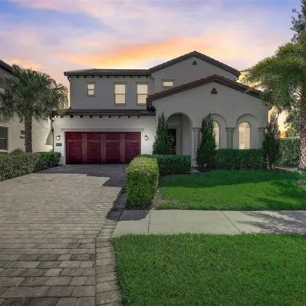 Buy this 5 bed house on Royal Cypress Way in Orange County, FL 32836