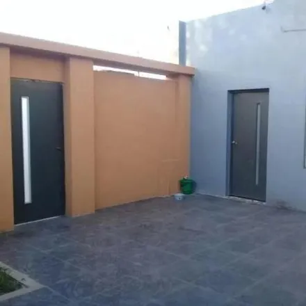 Buy this 4 bed house on Ana María Estevao 801 in Partido de Quilmes, 1886 Villa La Florida