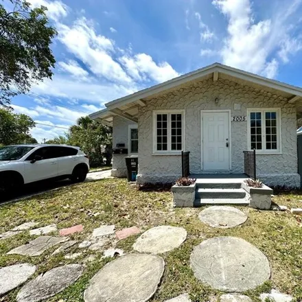 Rent this 4 bed house on 229 Butler Street in West Palm Beach, FL 33407