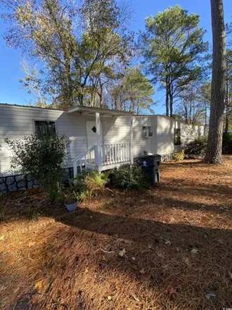 Buy this studio apartment on 127 Offshore Drive in Garden City Beach, Horry County