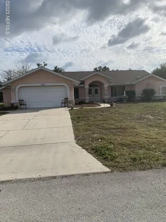 Buy this 3 bed house on 8014 Shorecrest Court in Spring Hill, FL 34606