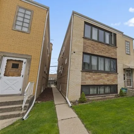 Buy this 8 bed house on 7237 West Belmont Avenue in Chicago, IL 60634