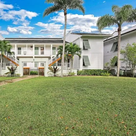 Rent this 2 bed condo on 261 Cypress Point Dr in Palm Beach Gardens, Florida