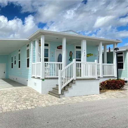Rent this 2 bed house on Northeast Coastal Drive in Ocean Breeze, Martin County