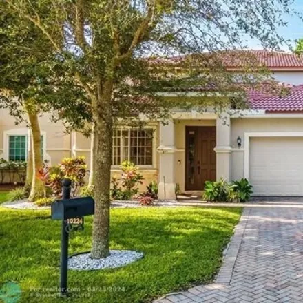 Rent this 4 bed house on Boca Vista Drive in Palm Beach County, FL 33498