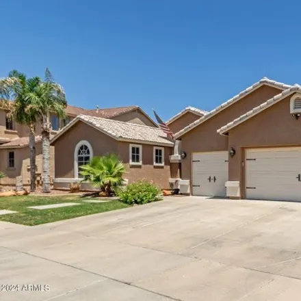 Buy this 4 bed house on 14088 West Poinsettia Drive in Surprise, AZ 85379