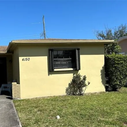 Buy this 3 bed house on 4158 Northwest 32nd Terrace in Lauderdale Lakes, FL 33309