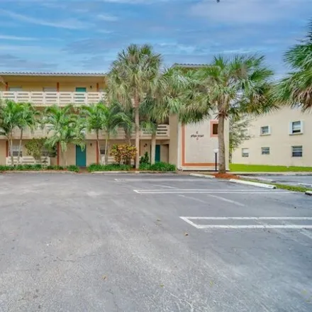 Buy this 2 bed condo on 3201 Northwest 103rd Terrace in Coral Springs, FL 33065