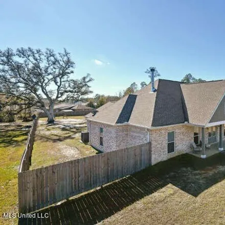 Image 2 - 100 Spanish Cove, Waveland, MS 39576, USA - House for sale