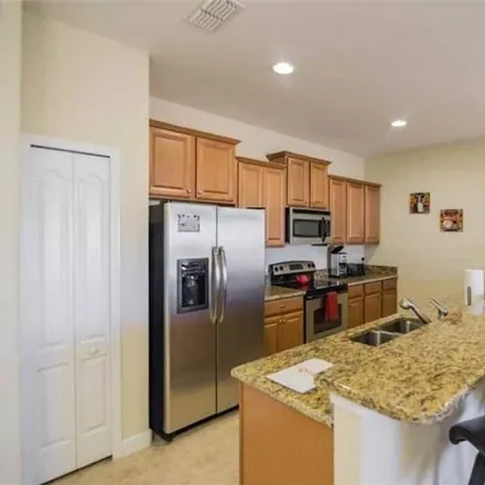 Rent this 4 bed townhouse on Kissimmee