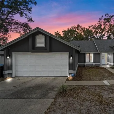 Buy this 4 bed house on 2098 Majestic Woods Boulevard in Orange County, FL 32712