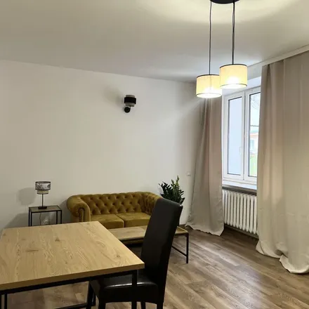 Rent this 1 bed apartment on Aleja "Solidarności" 71 in 00-090 Warsaw, Poland
