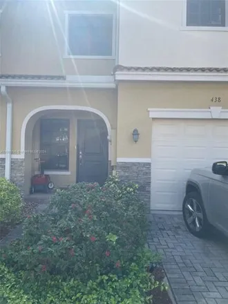 Rent this 3 bed townhouse on 438 Northeast 194th Terrace in Miami-Dade County, FL 33179