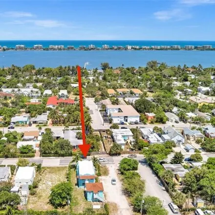 Buy this 9 bed house on 699 South M Street in Lake Worth Beach, FL 33460