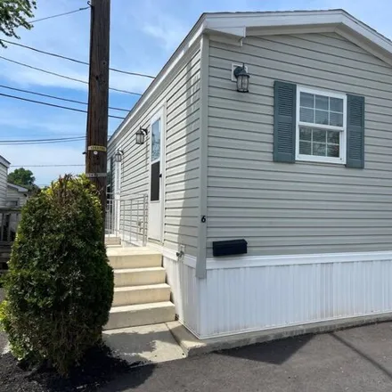 Buy this studio apartment on 6 3rd St in Avenel, New Jersey