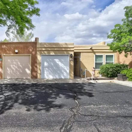 Buy this 2 bed townhouse on 6071 Del Campo Place Northeast in Albuquerque, NM 87109
