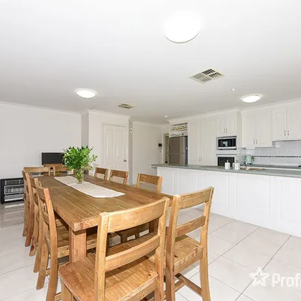 Rent this 4 bed apartment on Ebony Close in Hillvue NSW 2340, Australia