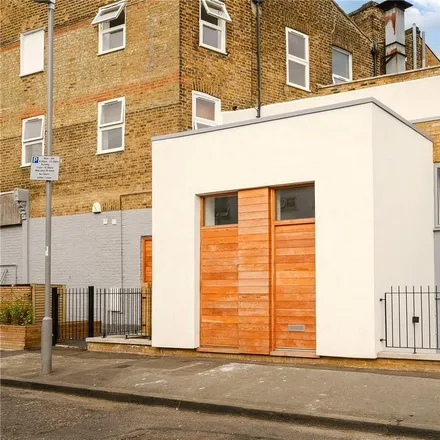 Rent this 2 bed townhouse on Katey's in Acre Road, London