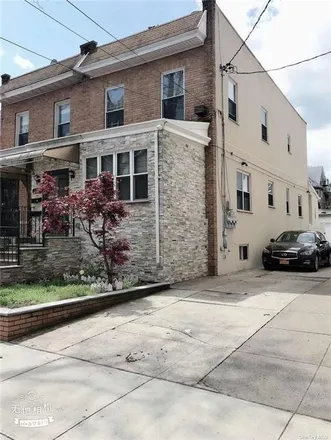 Buy this 5 bed townhouse on 1026 72nd Street in New York, NY 11228