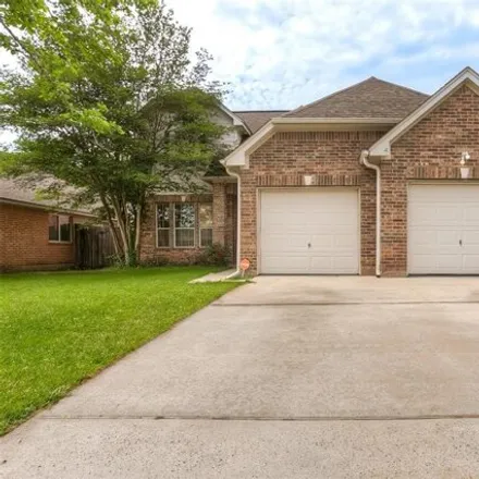 Buy this 3 bed house on 1040 Oak Falls Drive in Conroe, TX 77378