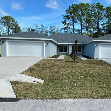 Rent this 4 bed house on 16 Karas Trail in Palm Coast, FL 32164