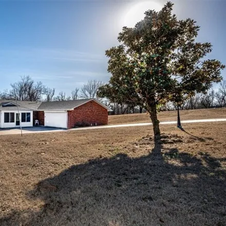 Buy this 4 bed house on 12098 Northeast 26th Street in Nicoma Park, Oklahoma County