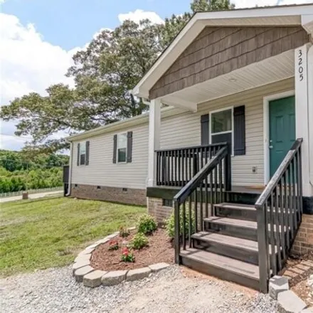 Rent this 2 bed house on 3205 Oakdale Road in Charlotte, NC 28216