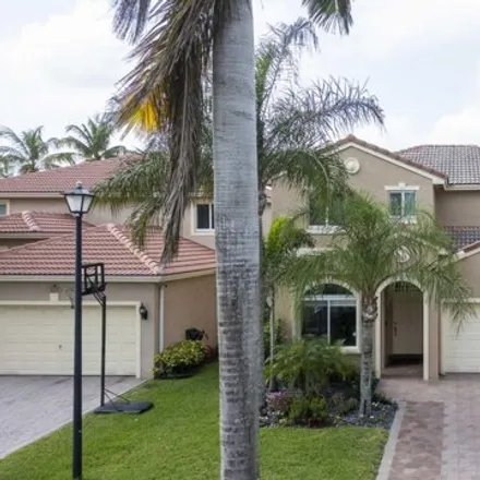 Buy this 4 bed house on 4239 Banyan Trails in Coconut Creek, FL 33073