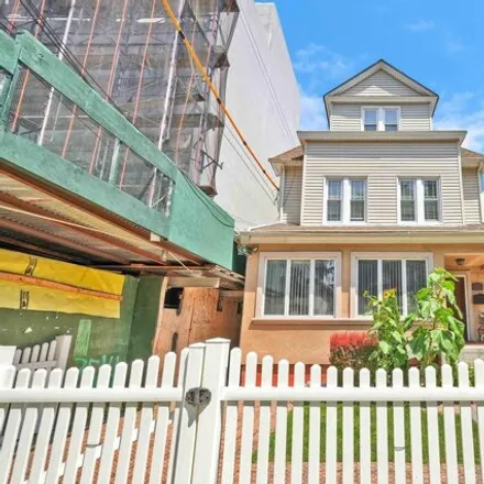 Buy this 7 bed house on 3107 Farragut Road in New York, NY 11210