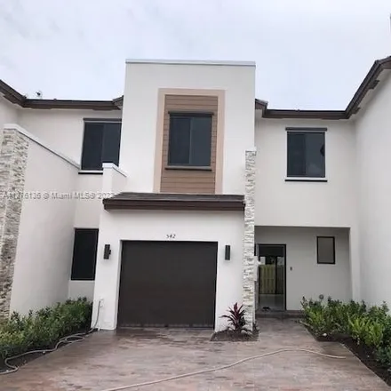 Rent this 3 bed townhouse on 20681 Northeast 206th Lane in Miami-Dade County, FL 33179