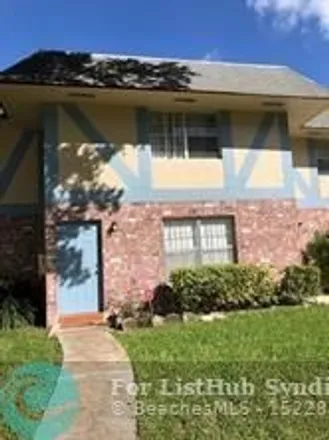 Rent this 2 bed townhouse on 7503 Kimberly Boulevard in North Lauderdale, FL 33068
