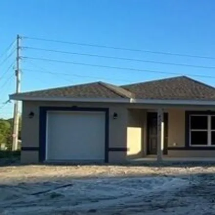 Buy this 4 bed house on 4141 Southeast 134th Place in Marion County, FL 34420