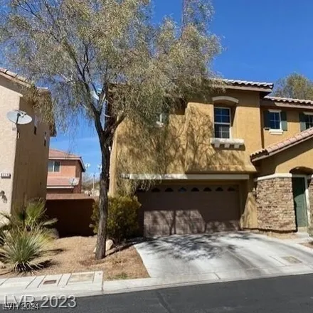 Buy this 4 bed house on 8700 West Charm Canyon Avenue in Clark County, NV 89178