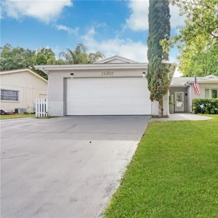 Buy this 5 bed house on 12849 Winding Way in Bayonet Point, FL 34667